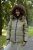 Ciepła pikowana zimowa kurtka damska z kapturem.