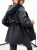 Długa czarna kurtka damska przejściowa tył krój typu parka